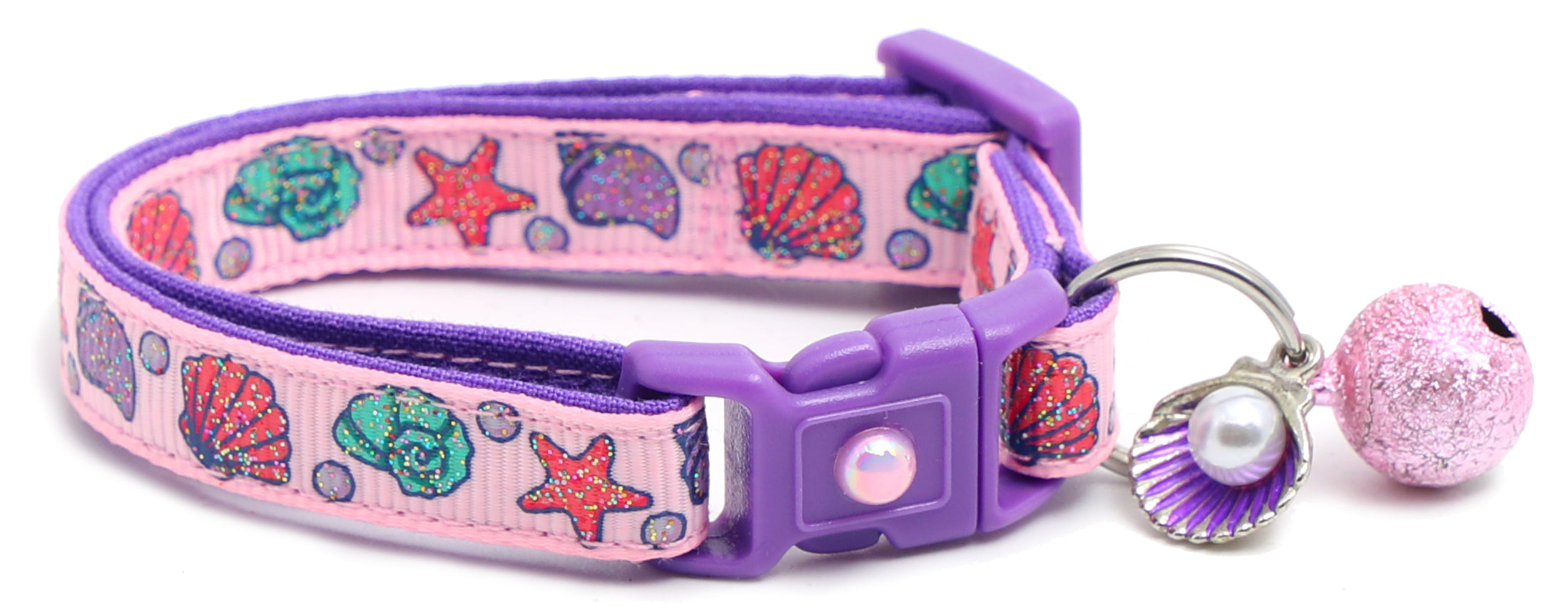 Beachcomber Breakaway Cat Collar in vibrant colors, featuring a breakaway clip and removable bell, made from soft reinforced cotton.
